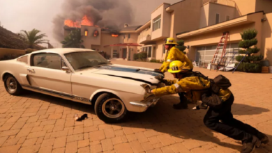 Photo of Firefighters Push a Mustang GT350 Out of a Burning Home in California.