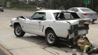 Photo of The Aftermath Of A Collision Between A Classic Ford Mustang And A Nissan Juke.