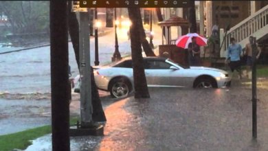 Photo of Driver Got His Beautiful Silver Chevy Camaro Stuck In a Middle of Rain Flood.